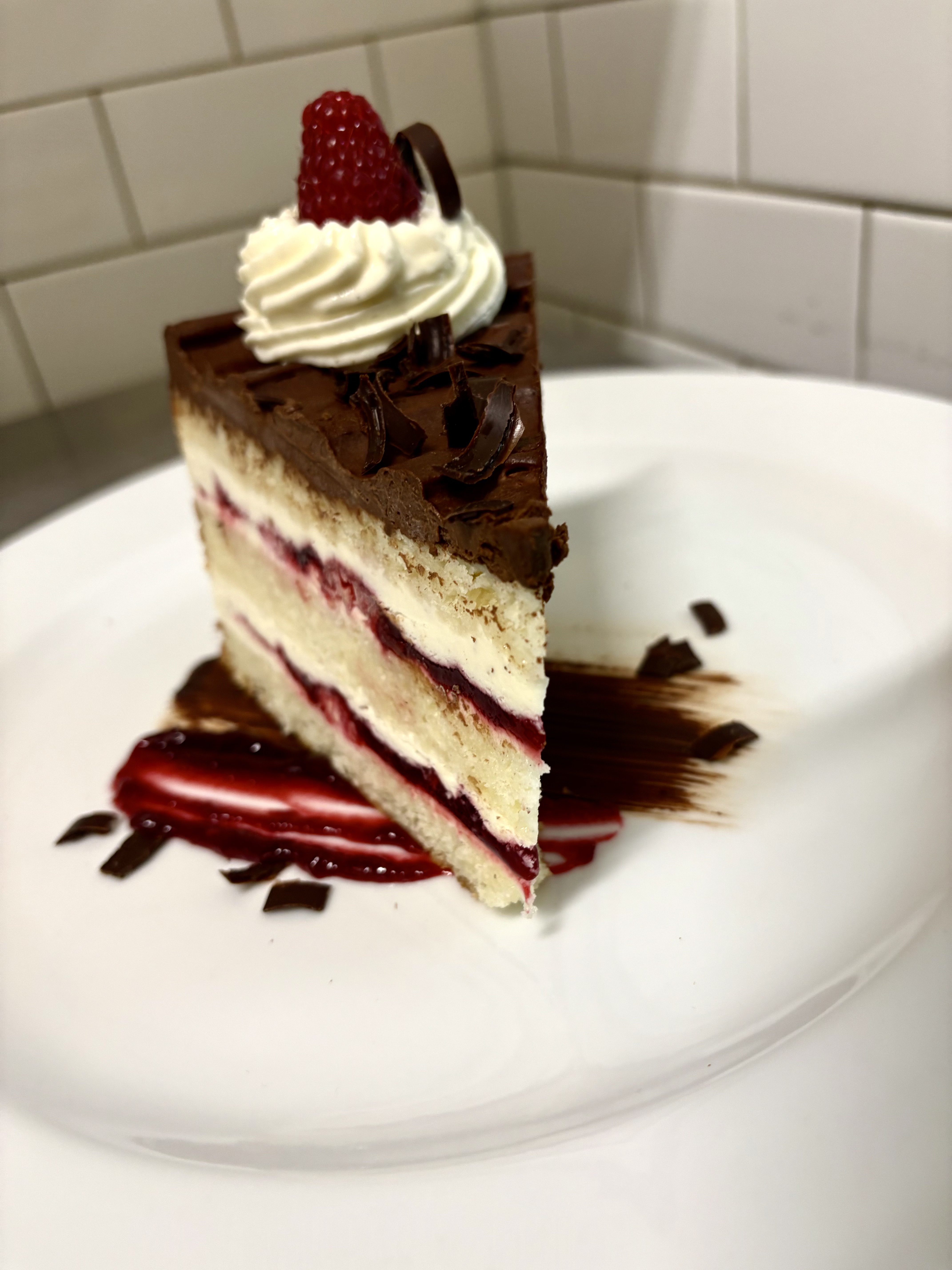 A single-serve chocolate strawberry cake, beautifully plated